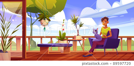 Woman with cat relax at outdoor home terrace. 89597720