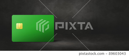 Green credit card on a black concrete background Green credit card on a black concrete background 89603043