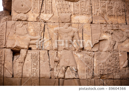 Different hieroglyphs on the walls and columns in the Karnak temple. Karnak temple is the largest complex in ancient Egypt. 89604366