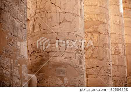 Different columns with hieroglyphs in Karnak temple. Karnak temple is the largest complex in ancient Egypt. 89604368