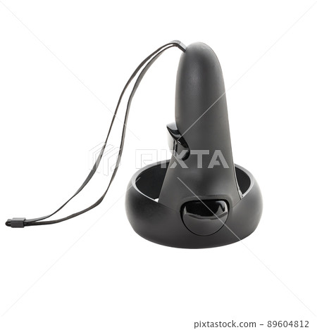 Close-up of the inverted joystick from the VR helmet isolated on a white background. One of the controllers from the virtual reality kit. Close-up of the inverted joystick from the VR helmet isolated on a white background. One of the controllers from the virtual reality kit. 89604812