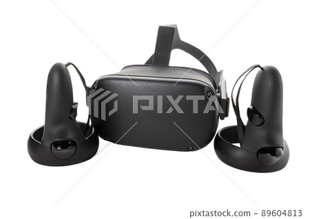 Close-up of joysticks and VR helmet isolated on white background. Virtual reality kit. Two controllers and VR glasses. Front side view. Close-up of joysticks and VR helmet isolated on white background. Virtual reality kit. Two controllers and VR glasses. Front side view. 89604813