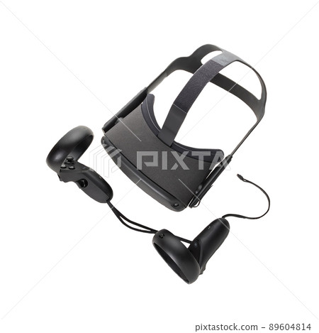 Top view of the virtual reality kit. Joysticks and VR glasses isolated on a white background. Two controllers and a VR helmet. Top view of the virtual reality kit. Joysticks and VR glasses isolated on a white background. Two controllers and a VR helmet. 89604814
