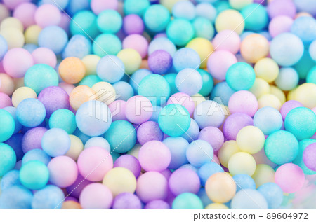 Foam beads of various colors brightly colored abstract background. 89604972