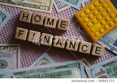 Text home finance calculator and cash on table 89605133
