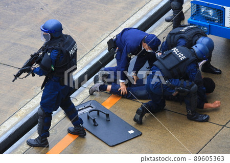 Public training on counterterrorism by police firearms countermeasures team Public training on counterterrorism by police firearms countermeasures team 89605363