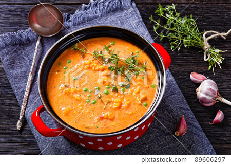 roast sweet potato and carrot soup with green peas roast sweet potato and carrot soup with green peas 89606297