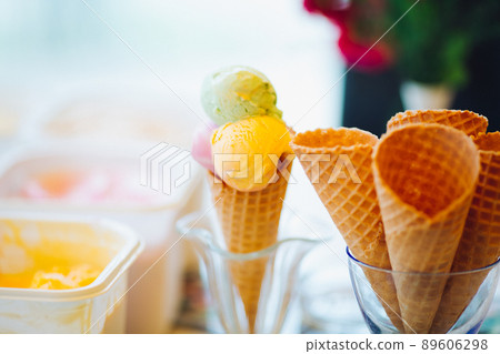 Empty waffle cone in glass for ice cream. Empty waffle cone in glass for ice cream. 89606298
