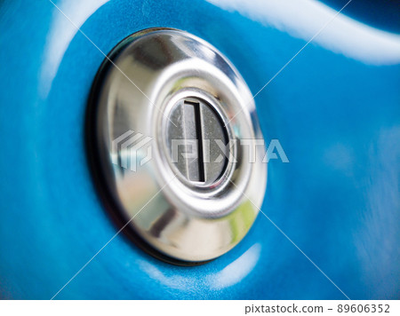 Close-up view of the key hole on a blue car 89606352