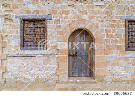 Door and windows of one of the rooms surrounding the main yard of the citadel of Alexandria, Egypt Door and windows of one of the rooms surrounding the main yard of the citadel of Alexandria, Egypt 89606627