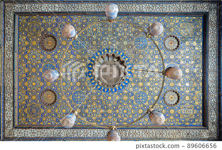 Ornate ceiling with blue and golden floral pattern decorations at Sultan Barquq mosque, Cairo, Egypt Ornate ceiling with blue and golden floral pattern decorations at Sultan Barquq mosque, Cairo, Egypt 89606656