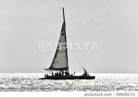 Beautiful yacht in the open sea on a sunny day Beautiful yacht in the open sea on a sunny day 89609233