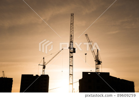 Highrise building and large crane 89609259