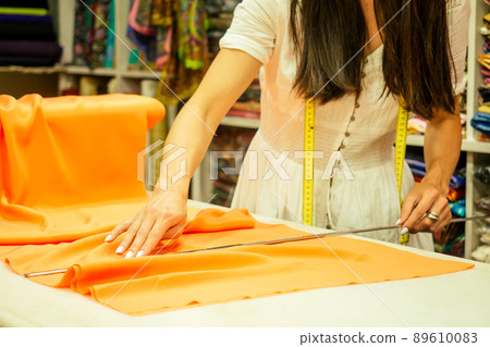 business lady shop owner cashmere yak wool shawls.female seller in goa india 89610083