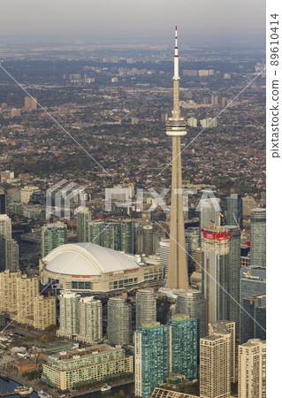 The CN Tower and Rogers Centre during a sunny day The CN Tower and Rogers Centre during a sunny day 89610414