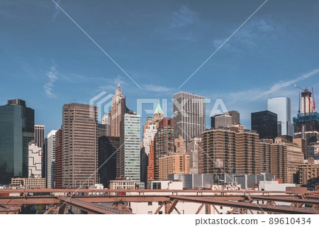 The Lower Manhattan of New York City as seen from Brooklyn bridge 89610434
