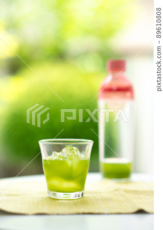 Cold tea by the window Cold tea by the window 89610808