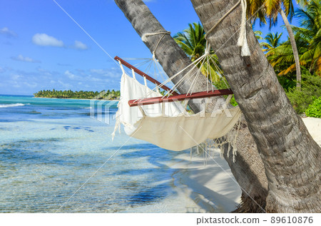 Hammock on tropical beach in Dominican Republic 89610876