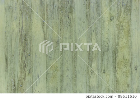 Old wooden worn fence boards weathered texture in peeling green paint dirty obsolete background Old wooden worn fence boards weathered texture in peeling green paint dirty obsolete background 89611610