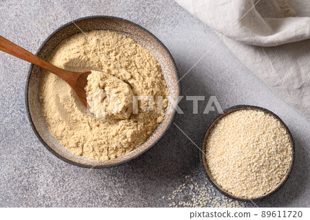 Sesame flour for cooking vegan gluten-free dessert. 89611720