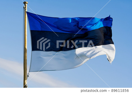 The flag of Estonia - horizontal stripes of blue, black and white on a background of blue sky The flag of Estonia - horizontal stripes of blue, black and white on a background of blue sky 89611856