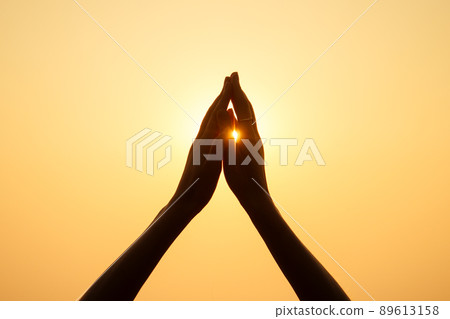 friends giving palms clap at sunset in Goa friends giving palms clap at sunset in Goa 89613158
