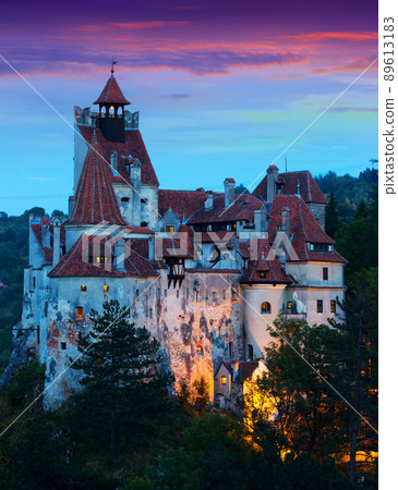 Bran Castle on cliff top on twilight Bran Castle on cliff top on twilight 89613183