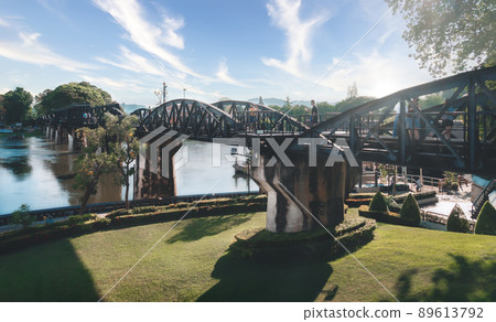 People are crossing the historical bridge of World War 2 in River Kwai. People are crossing the historical bridge of World War 2 in River Kwai. 89613792