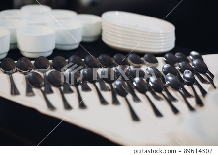 Many cleaning dessert spoon on kitchen.Concept of 89614302