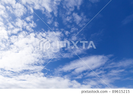 Blue sky with white clouds on a daytime 89615215