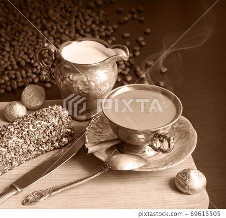 Sweets on the background of coffee on the table Sweets on the background of coffee on the table 89615505