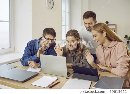 Smiling young people have webcam computer call Smiling young people have webcam computer call 89615651