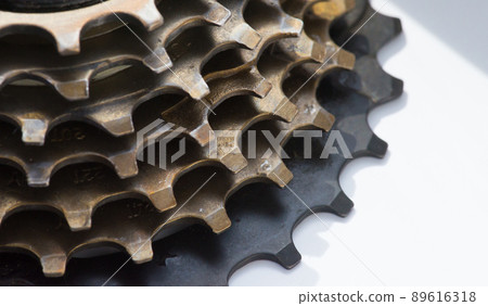 Stars and teeth of a bicycle cassette close-up 89616318