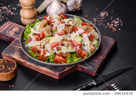 Delicious spring fresh vegetable salad with cherry tomatoes, cucumber, breadcrumbs and parmesan cheese Delicious spring fresh vegetable salad with cherry tomatoes, cucumber, breadcrumbs and parmesan cheese 89616439