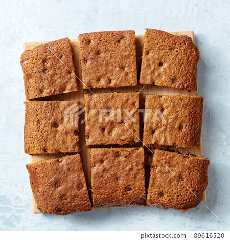 Blondie brownie dessert bars with chocolate chips, shot from the top 89616520