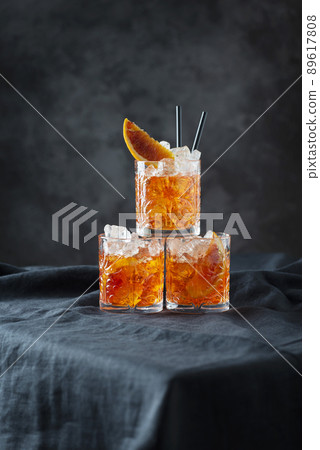Italian traditional cocktail Aperol Spritz with orange 89617808