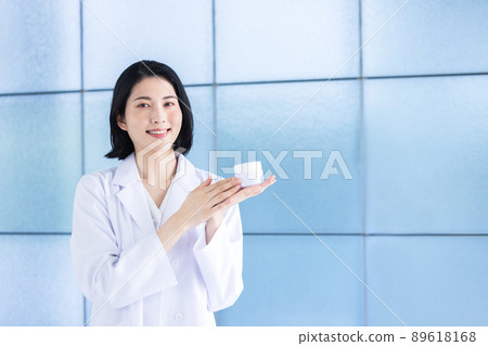 A lady in white 89618168