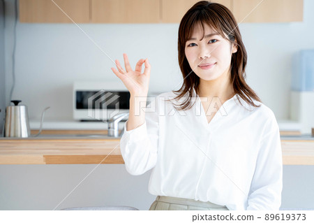 Young woman kitchen lifestyle Young woman kitchen lifestyle 89619373