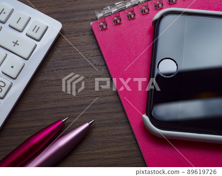 Business image of notebooks and smartphones (female) Business image of notebooks and smartphones (female) 89619726