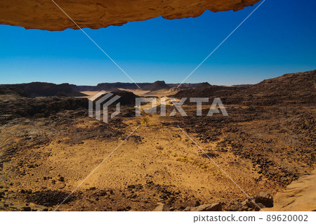 Aerial panoramic view to El Berdj mountain and erg gorge in Tassili nAjjer national park, Algeria Aerial panoramic view to El Berdj mountain and erg gorge in Tassili nAjjer national park, Algeria 89620002
