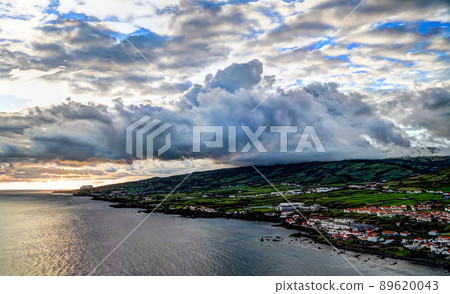 Sunset view to Porto Pim Bay from mount Guia at Faial island, Azores, Portugal 89620043