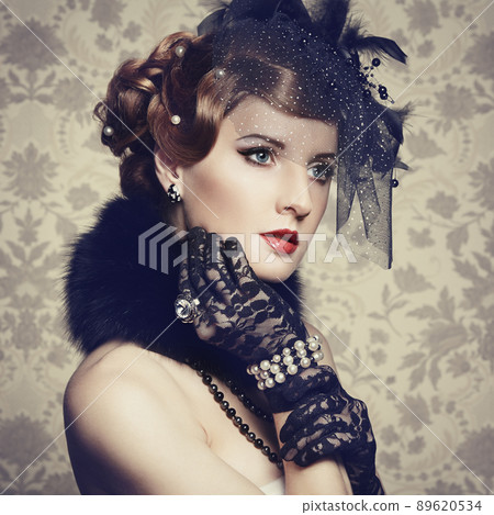 Retro portrait of  beautiful woman. Vintage style 89620534