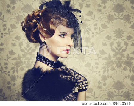 Retro portrait of beautiful woman. Vintage style Retro portrait of beautiful woman. Vintage style 89620536