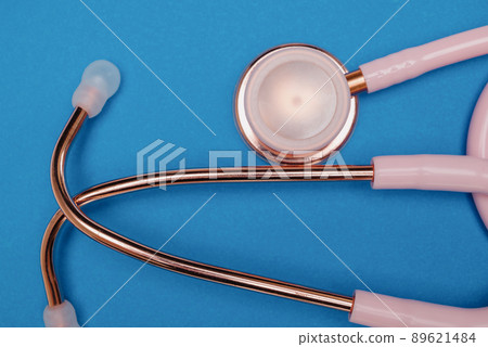 Medical stethoscope.Pink medical stethoscope.The concept of healthcare. Medical stethoscope.Pink medical stethoscope.The concept of healthcare. 89621484