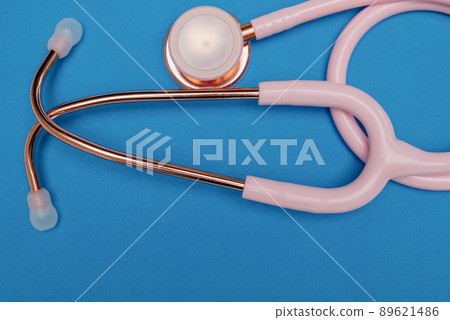 Medical stethoscope.Pink medical stethoscope.The concept of healthcare. Medical stethoscope.Pink medical stethoscope.The concept of healthcare. 89621486