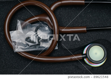 Medical stethoscope. Brown medical stethoscope.The concept of healthcare. Medical stethoscope. Brown medical stethoscope.The concept of healthcare. 89621548