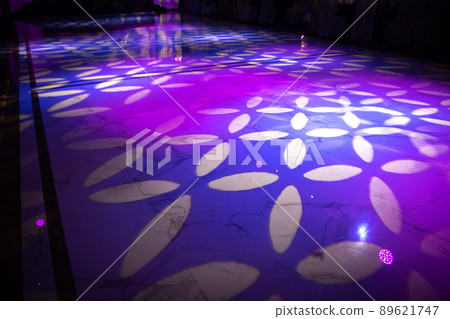Light pattern on a dark dance floor created by professional lighting equipment 89621747