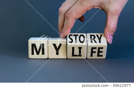 Story of my life symbol. Businessman turns wooden cubes and changes concept words My story to My life. Beautiful grey table grey background. Business story of my life concept. Copy space. Story of my life symbol. Businessman turns wooden cubes and changes concept words My story to My life. Beautiful grey table grey background. Business story of my life concept. Copy space. 89622977