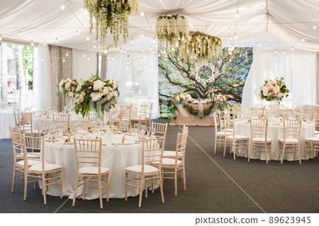 Wedding table decoration with flowers and ribbons Wedding table decoration with flowers and ribbons 89623945