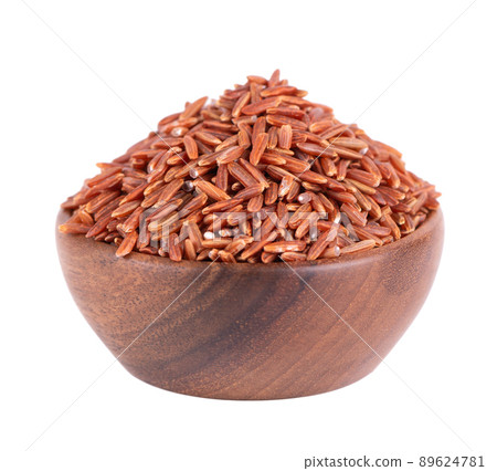 Red rice isolated in wooden bowl, on white background. Whole grain raw brown rice. Red rice isolated in wooden bowl, on white background. Whole grain raw brown rice. 89624781